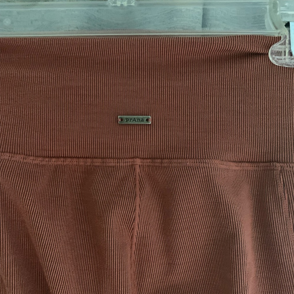 Prana orange Becksa yoga pants size medium.
